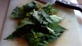 Roughly-chopped nettles on chopping board